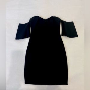 Black fitted mini dress with off the shoulder sleeves